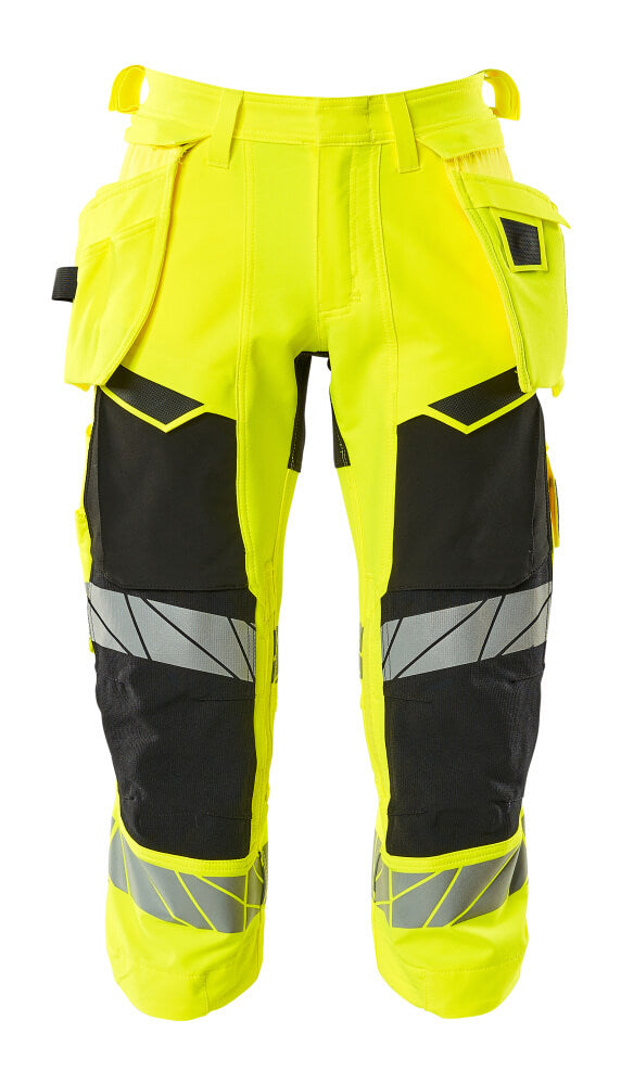 MASCOT® ACCELERATE SAFE 19049-711 – Pantalones ¾ con bolsillos colgantes - amarillo de alta vis./negro
