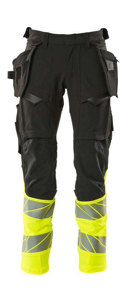 MASCOT® ACCELERATE SAFE 19131-711 – Pantalones con bolsillos colgantes - negro/amarillo de alta vis.