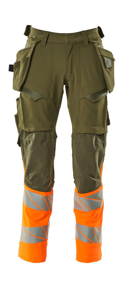 MASCOT® ACCELERATE SAFE 19131-711 – Pantalones con bolsillos colgantes - verde musgo/naranja de alta vis.